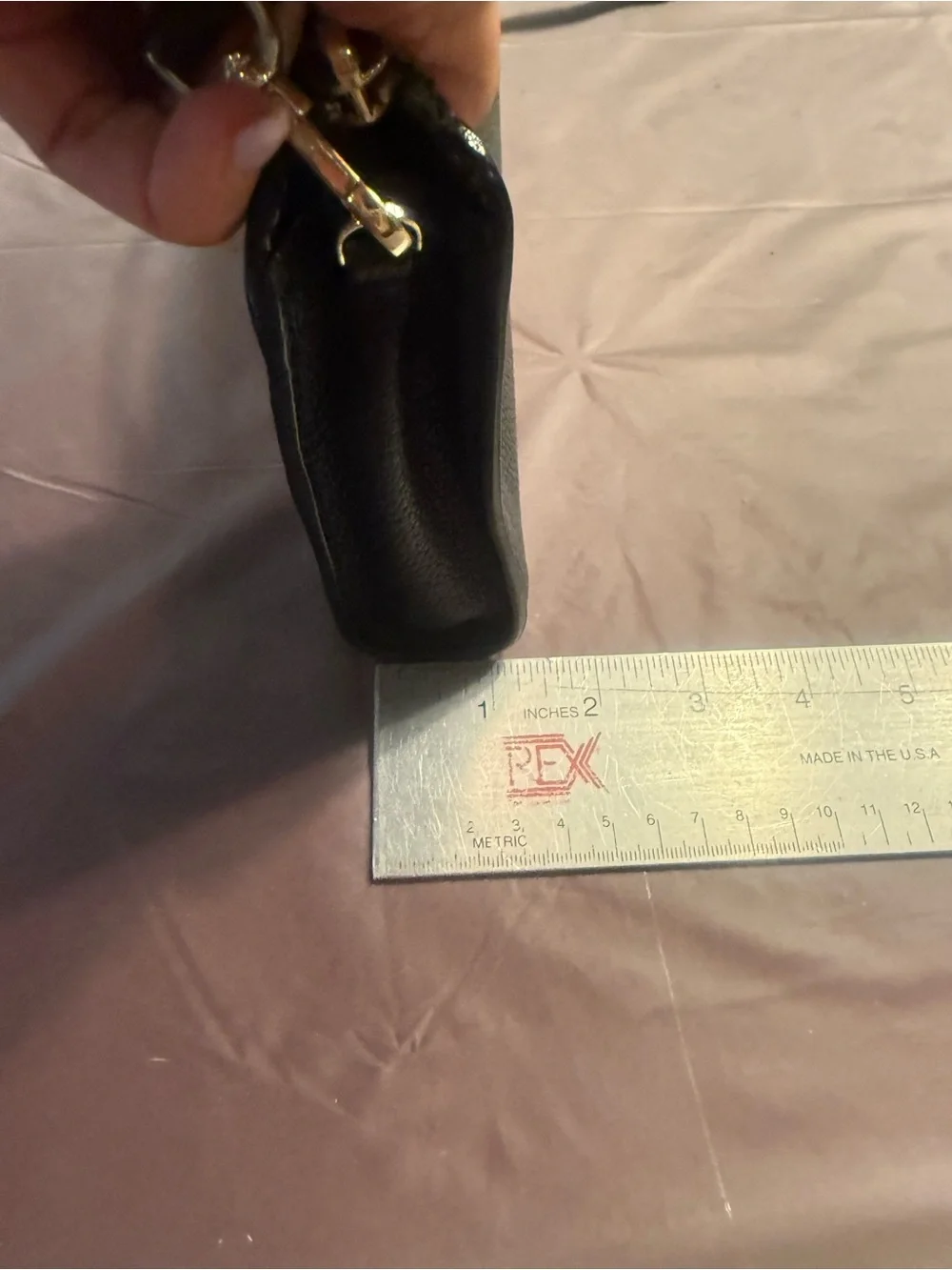 Kate Spade Knott small crossbody clutch in black pebbled leather